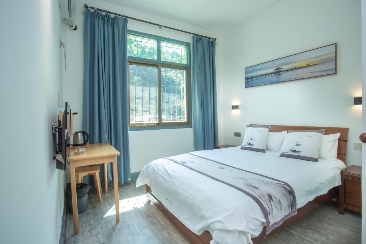 Nanjing Tulou Xinyuan HomeStay Bagian luar foto